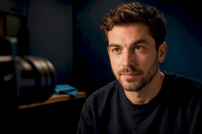 Presenter aligning gaze with video camera lens